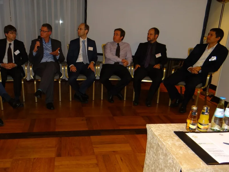 Panel discussion on stage at a previous Zenith Group event